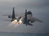 Fighter jet taking off in afterburner